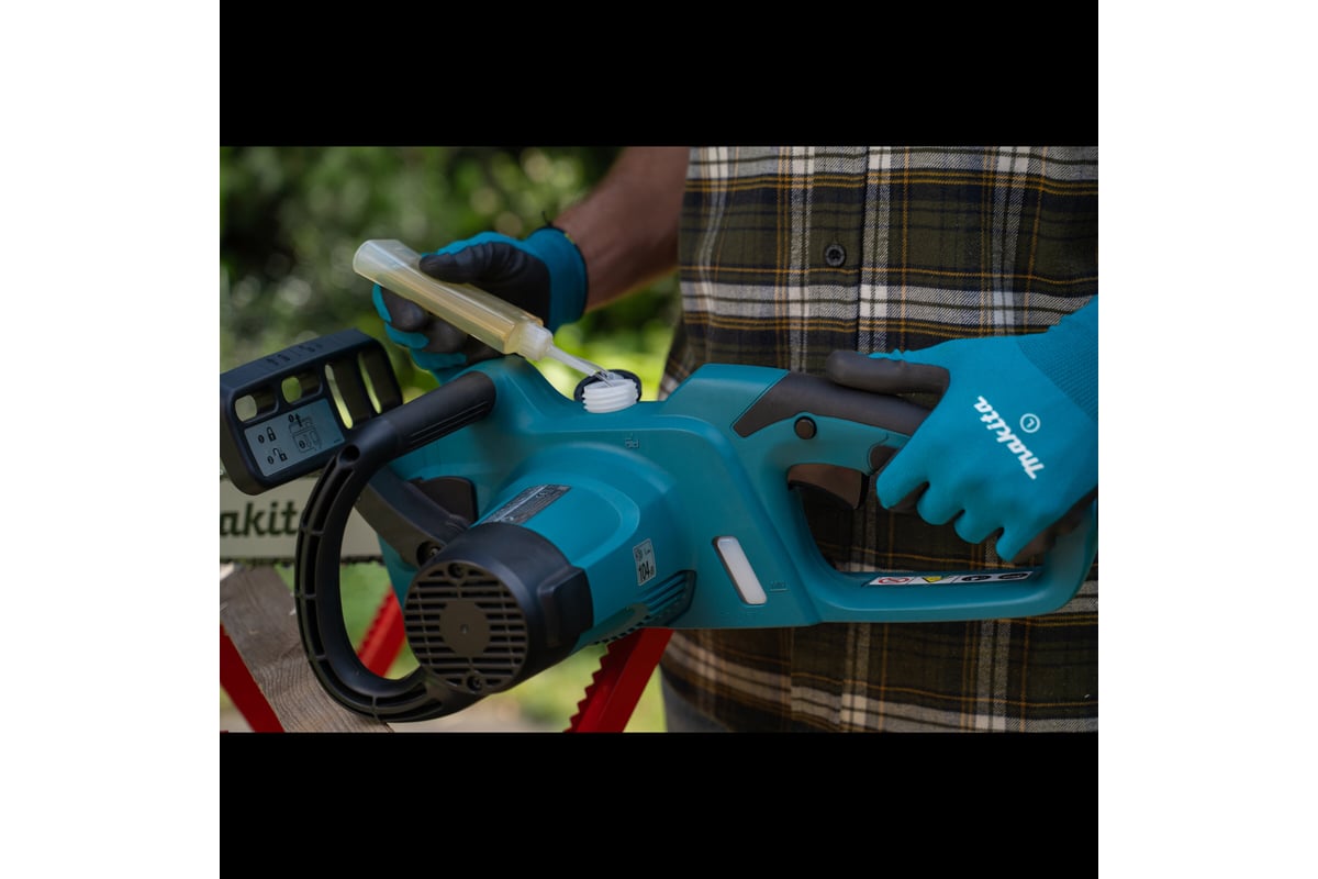 Электрическая цепная пила Makita UC4041A